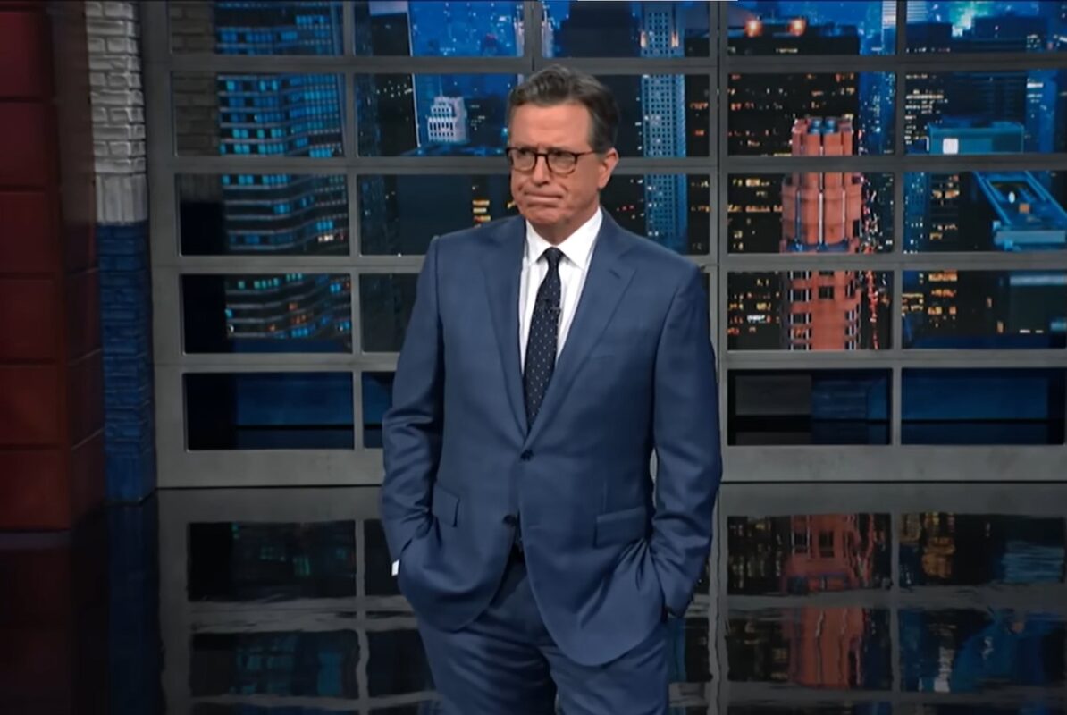 Stephen Colbert standing during The Late Show