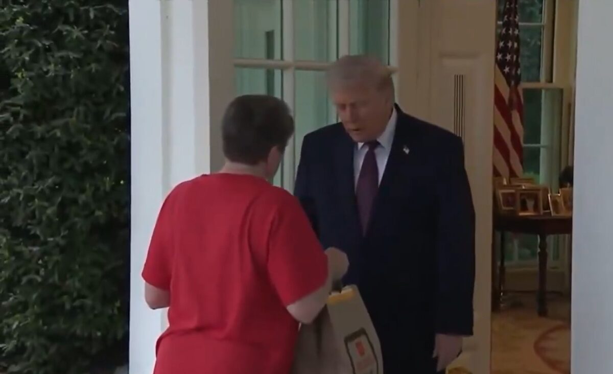 A woman delivering food to the President