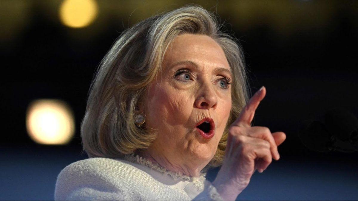 Hillary Clinton speaking and pointing a finger