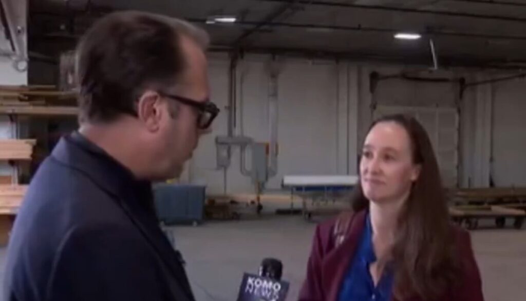 Katie Wilson being interviewed by a reporter
