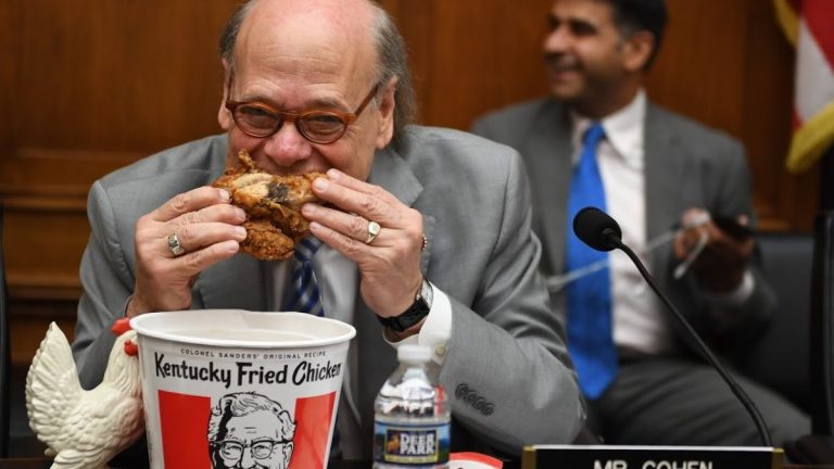 Steve Cohen eating fried chicken