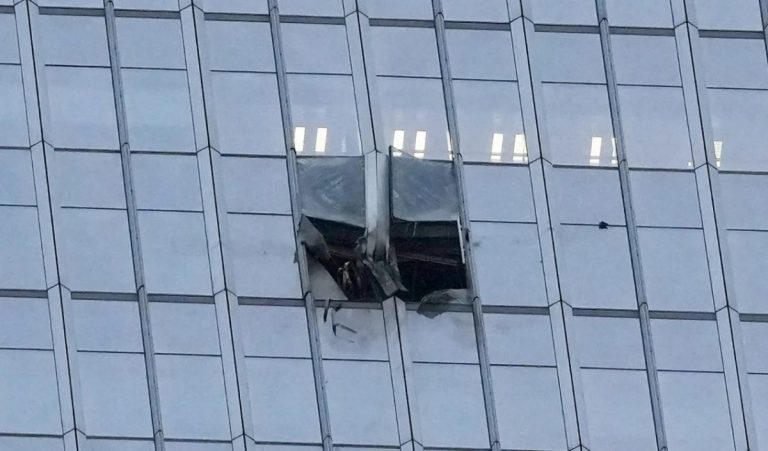 Broken windows on skyscraper